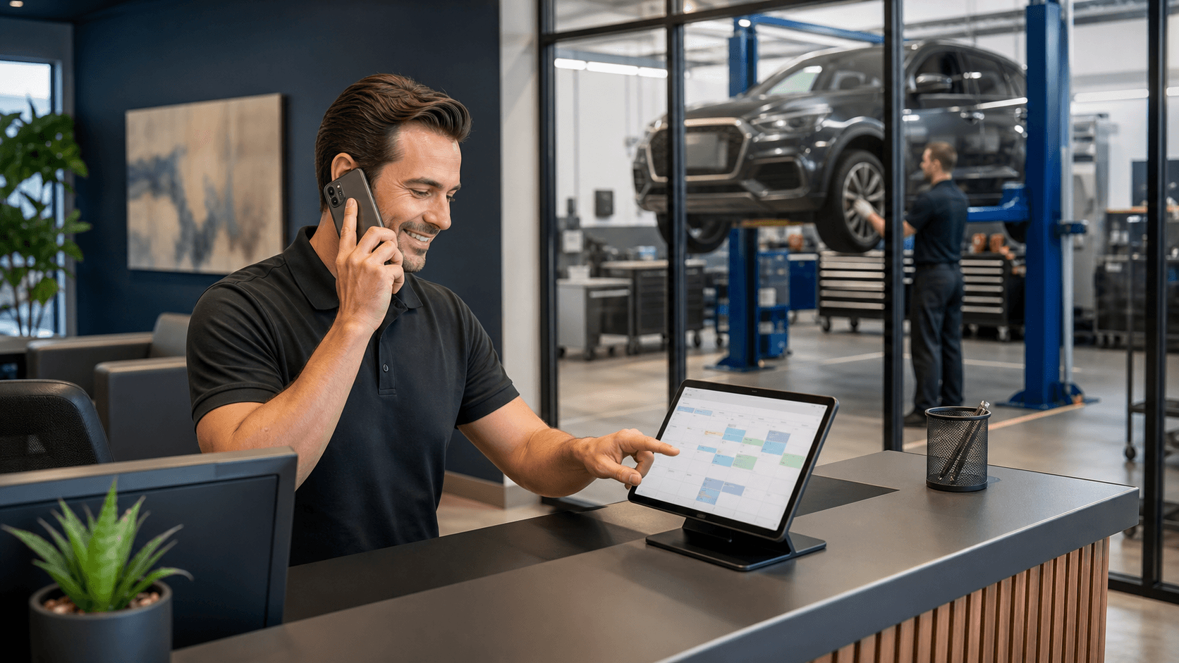 Mechanic uses a smartphone beside a silver car in a bright, modern auto repair shop.